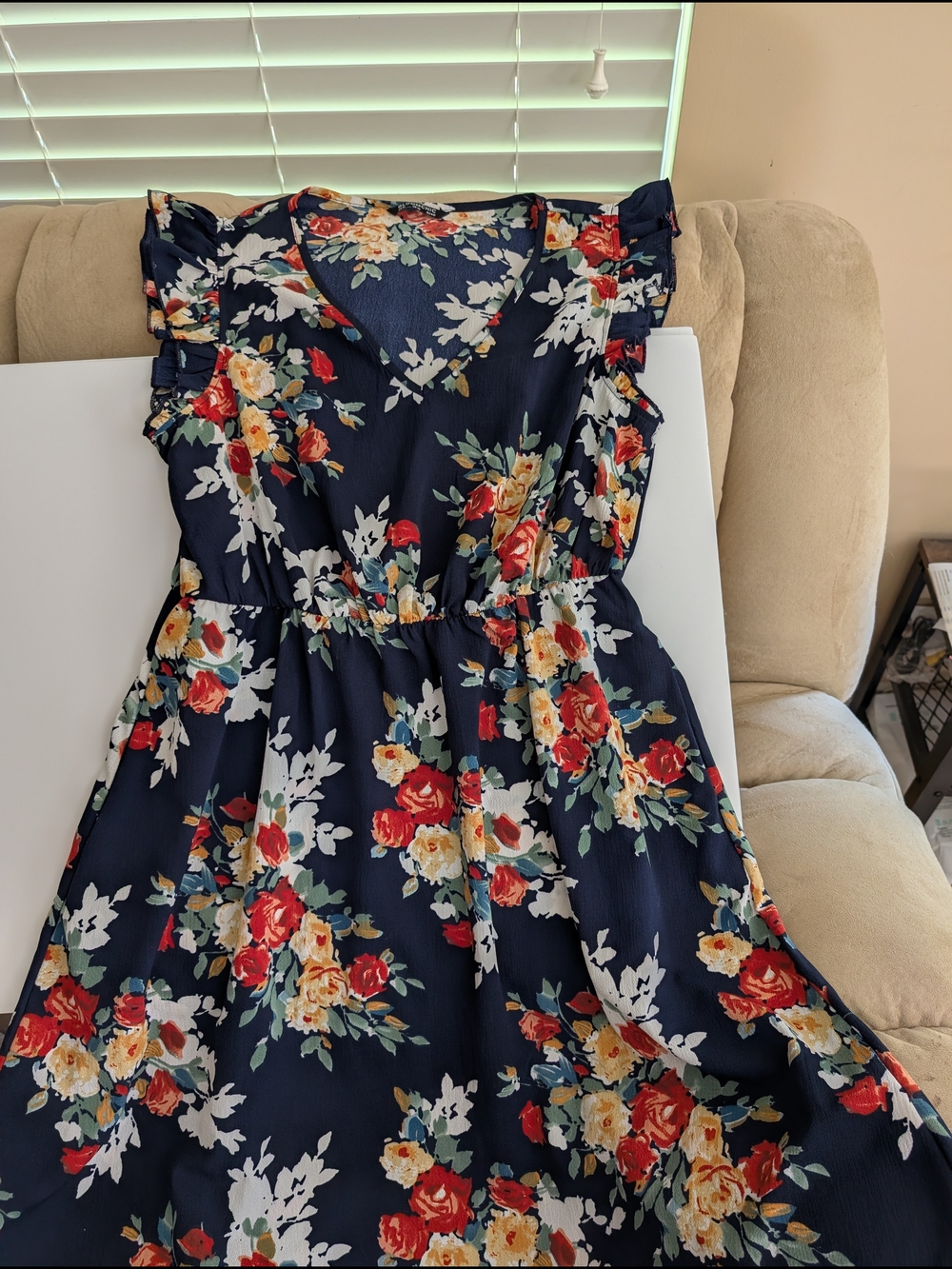 BloomChic Navy Dress with Red Floral Accents and flutter sleeves